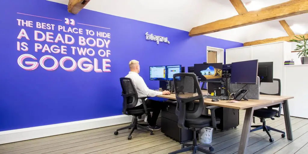 Picture of PMW’s office with the words ‘The best place to hide a dead body is page two of Google’ showing